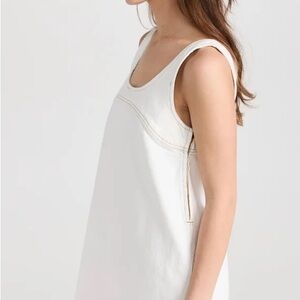 FRAME MICRO FLARE DENIM MINI DRESS IN WHITE | SIZE XS